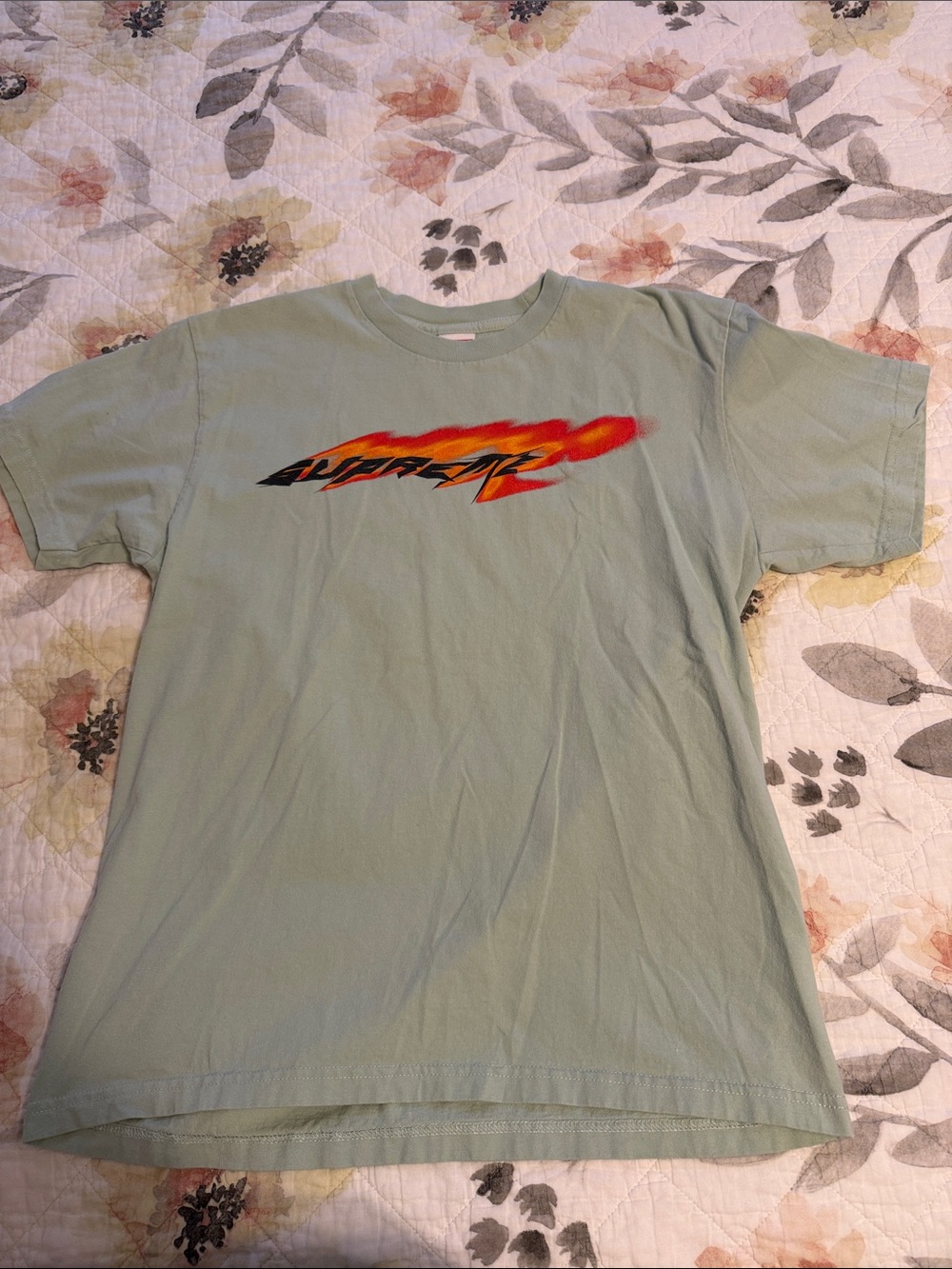 Supreme Sage Green Tee with Red-Orange Flame Logo